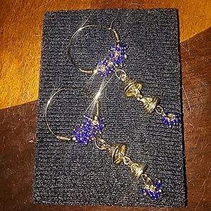 Purchased in India. Blue stones and gold overlay earrings.